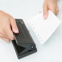 Paper punch tool from the stationary shop Kerala – office and educational supplies